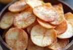 Crispy air fryer apple chips with cinnamon sugar topping