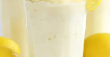 Chick-fil-A Lemonade in a clear cup with ice and lemon slices