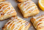 Delicious cream cheese danish pastry with a flaky crust and creamy filling.