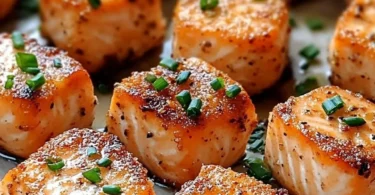 Crispy Bang Bang Salmon Bites served on a plate with dipping sauce