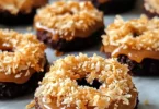 Homemade Samoas cookies with caramel and coconut on a plate
