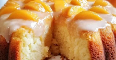 Delicious Peach Cobbler Pound Cake with fresh peaches and a golden crust