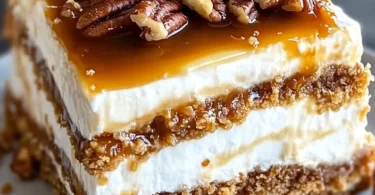 Delicious pecan pie lasagna with layers of creamy filling and pecans