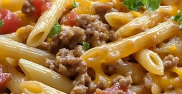 Delicious Rotel Pasta served with a creamy sauce and garnished with herbs