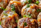 Spicy Jalapeño Popper Stuffed Meatballs on a plate