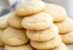 Freshly baked Amish Sugar Cookies stacked on a plate