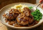 Aussie rissoles served with sides on a plate