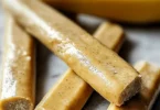Banana and peanut butter chew sticks for dogs, a healthy treat option.