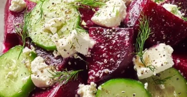 Fresh Beet Feta Salad with greens, beets, and crumbled feta cheese