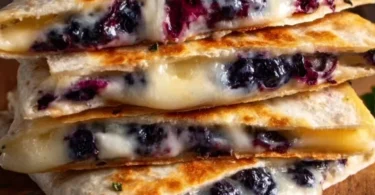 Delicious blueberry breakfast quesadillas served on a plate