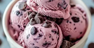 Crimson Choco Rhapsody Ice Cream in a bowl with chocolate drizzle