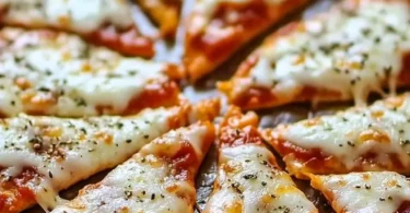 Delicious crispy pizza chips on a plate, perfect for snack attacks.