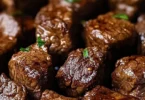 Crockpot steak bites cooked to perfection in a savory sauce