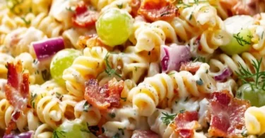 Dill Pickle Bacon Pasta Salad featuring pasta, dill pickles, and crispy bacon.