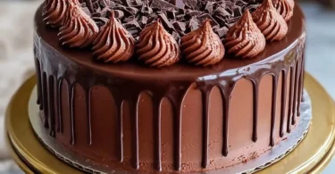 Elegant Chocolate Symphony Cake with rich layers and chocolate drizzle