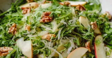 Fennel apple salad with fresh ingredients in a bowl