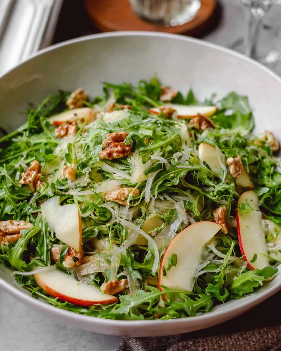 Fennel apple salad with fresh ingredients in a bowl
