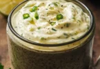 Delicious jar of jalapeño garlic mayo for sandwiches and dips