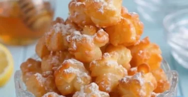 Delicious funnel cake bites served with powdered sugar
