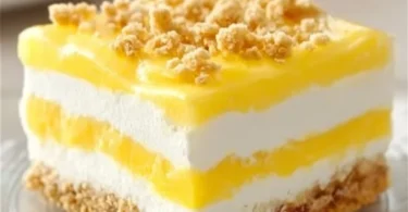 Heavenly Oreo Lemon Dessert with creamy layers and Oreo crust