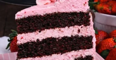 Homemade dark chocolate cake with strawberry buttercream frosting