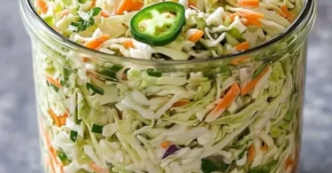 Fresh Jalapeño Coleslaw served in a bowl with colorful vegetables