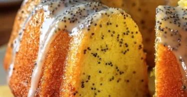 Delicious lemon poppy seed cake garnished with lemon zest and poppy seeds