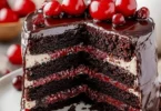 Luxurious Black Forest Cake with chocolate layers and cherries