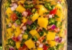 Bowl of Mango Jalapeño Salsa with fresh ingredients