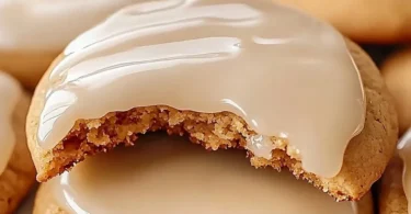 Freshly baked maple cookies with glossy maple icing on top