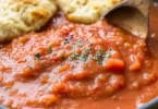 Delicious Old-Fashioned Southern Tomato Gravy served over biscuits