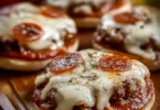 Delicious homemade pizza burgers topped with cheese and pepperoni