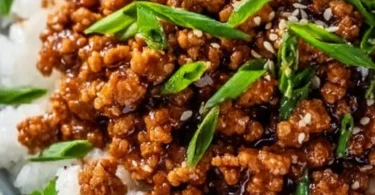 Plate of honey garlic ground turkey garnished with vegetables