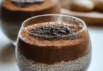 Delicious tiramisu chia pudding in a glass with cocoa sprinkle