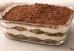 Delicious homemade tiramisu layered with coffee-soaked ladyfingers and creamy mascarpone