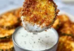 Crispy air fryer zucchini chips ready to enjoy as a healthy snack