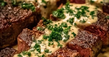 Delicious creamy garlic sauce steak garnished with herbs