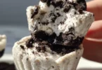 Healthy no-bake Oreo cheesecake bites on a decorative plate