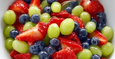 Honey Lime Fruit Salad with assorted fresh fruits and a tangy honey lime dressing