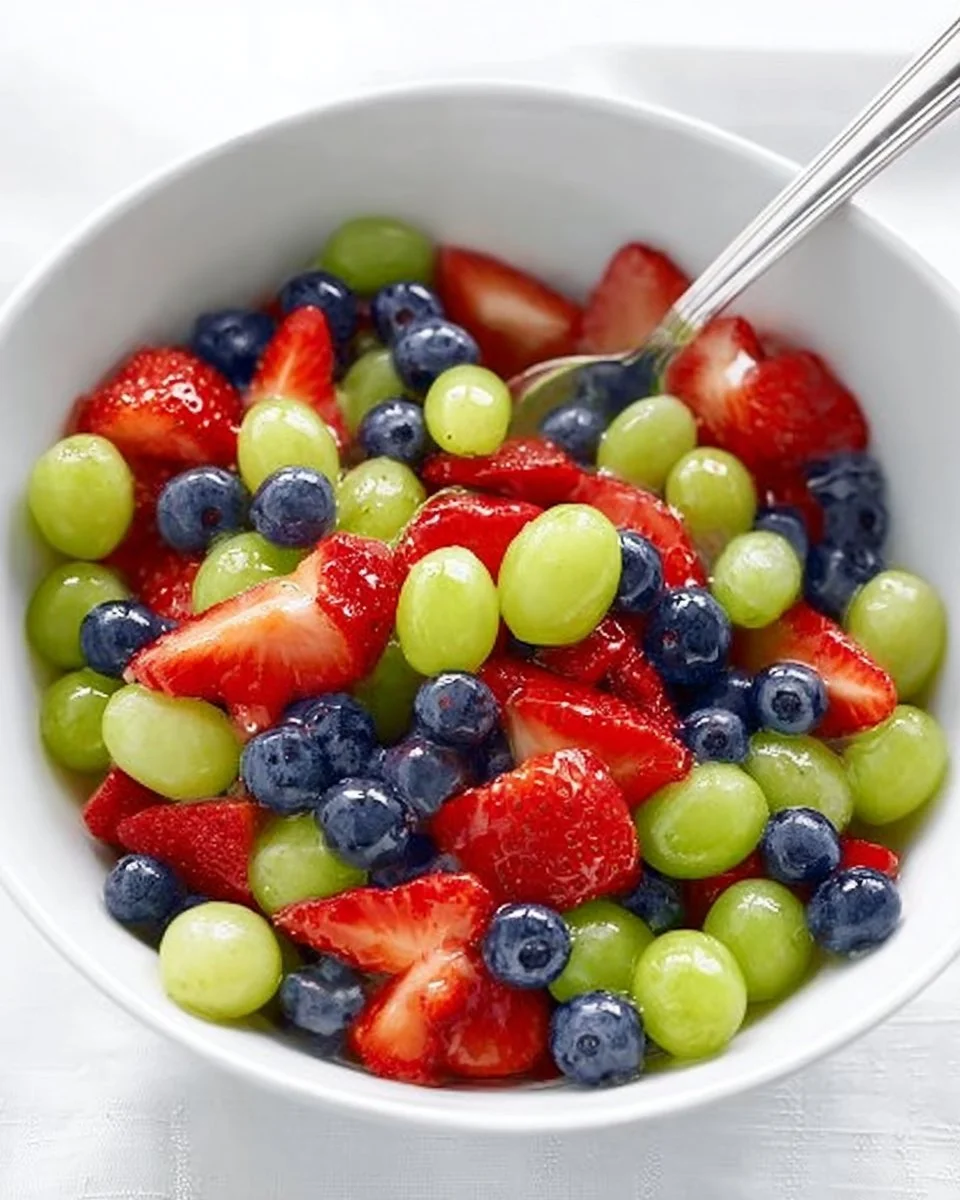 Honey Lime Fruit Salad with assorted fresh fruits and a tangy honey lime dressing