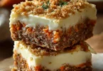Irresistible carrot cake cream cheese bars topped with creamy frosting.