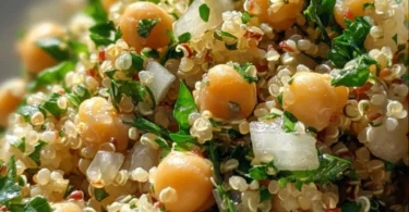 Lemon Herb Quinoa with Chickpeas served in a bowl, garnished with fresh herbs.