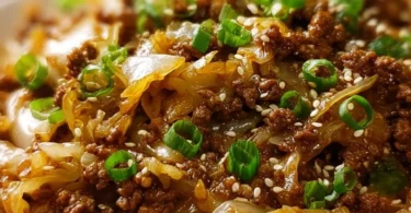 Low-carb Mongolian ground beef served with sautéed cabbage in a bowl