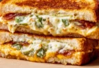 Roasted jalapeno popper grilled cheese sandwich with melting cheese
