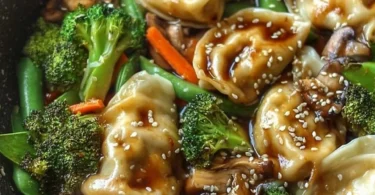 Delicious potsticker stir fry with vibrant vegetables and savory sauce.