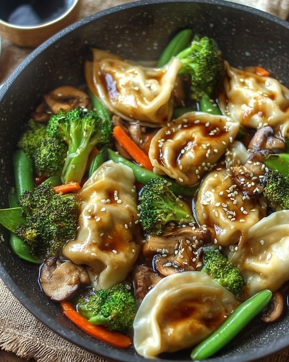 Delicious potsticker stir fry with vibrant vegetables and savory sauce.