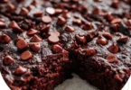 Double Chocolate Cottage Cheese Bake served in a dish, drizzled with chocolate.