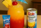 Delicious Island Punch and Pineapple Breeze cocktails served in tropical glasses.