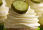 Delicious pickle cupcakes topped with cream cheese frosting