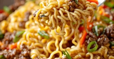 Delicious slow cooker beef ramen noodles served in a bowl with fresh vegetables.